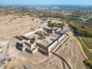 GANSU, CHINA - OCT 20, 2024-The aerial view of Jiayuguan is a pass standing at the western end of the Ming Dynasty Great Wall, The silk road in Gansu, China clipart