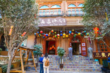 Kashgar, China-OCT, 25, 2024 - Street view and life style of Uyghur in Kashgar Old City in Xinjiang, western China. It is one of the oldest continuously inhabited cities in the world. clipart