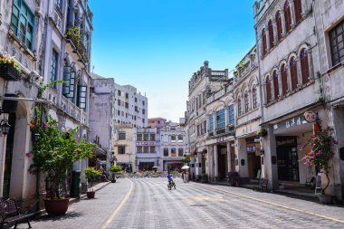 Haikou, China-SEP 13, 2025-Zhongshan Road particularly known for its historic Qilou Arcade Houses, are a key part of the city's cultural heritage, is the capital and most populous city of Hainan.