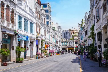 Haikou, China-SEP 13, 2025-Zhongshan Road particularly known for its historic Qilou Arcade Houses, are a key part of the city's cultural heritage, is the capital and most populous city of Hainan.