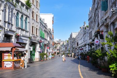 Haikou, China-SEP 13, 2025-Zhongshan Road particularly known for its historic Qilou Arcade Houses, are a key part of the city's cultural heritage, is the capital and most populous city of Hainan.