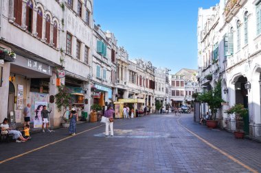 Haikou, China-SEP 13, 2025-Zhongshan Road particularly known for its historic Qilou Arcade Houses, are a key part of the city's cultural heritage, is the capital and most populous city of Hainan.