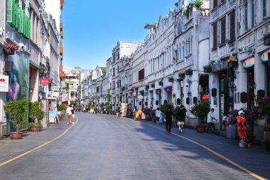 Haikou, China-SEP 13, 2025-Zhongshan Road particularly known for its historic Qilou Arcade Houses, are a key part of the city's cultural heritage, is the capital and most populous city of Hainan.
