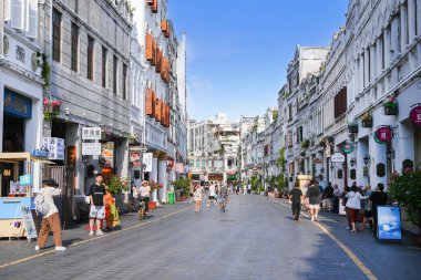 Haikou, China-SEP 13, 2025-Zhongshan Road particularly known for its historic Qilou Arcade Houses, are a key part of the city's cultural heritage, is the capital and most populous city of Hainan.