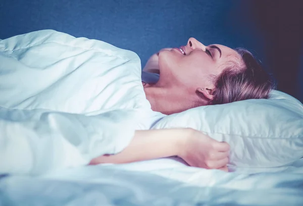 Stock image Beautiful young blonde woman sleeping in bed.