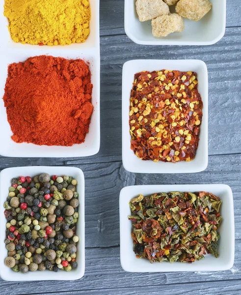 Various Spices Bowls Gray Background — Stock Photo, Image