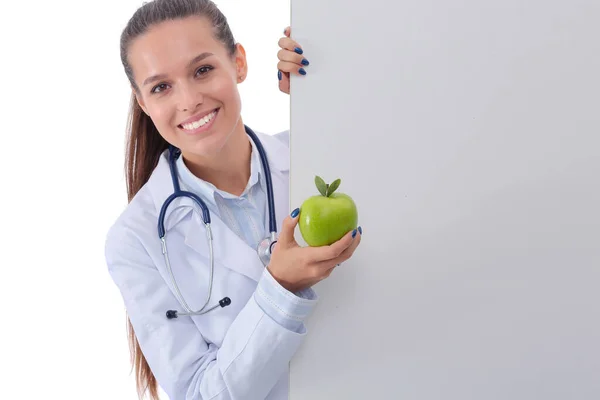 用苹果和空白横幅微笑医生 女医生 — 图库照片
