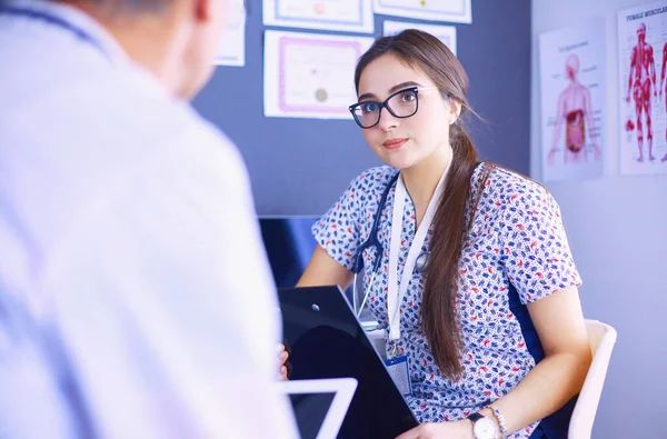 Two Doctors Speaking Bright Office — Stock Photo, Image