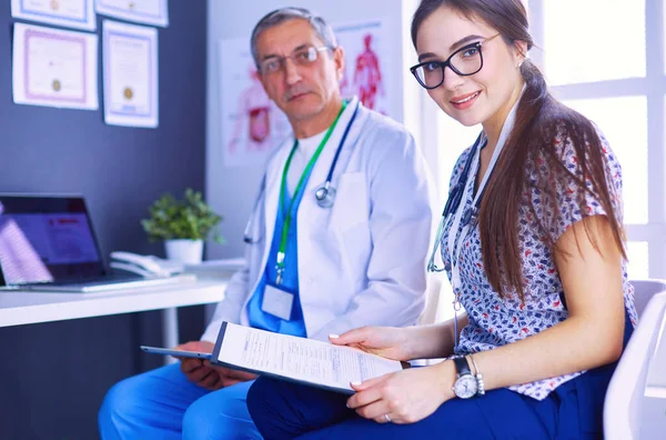 Two Doctors Speaking Bright Office — Stock Photo, Image