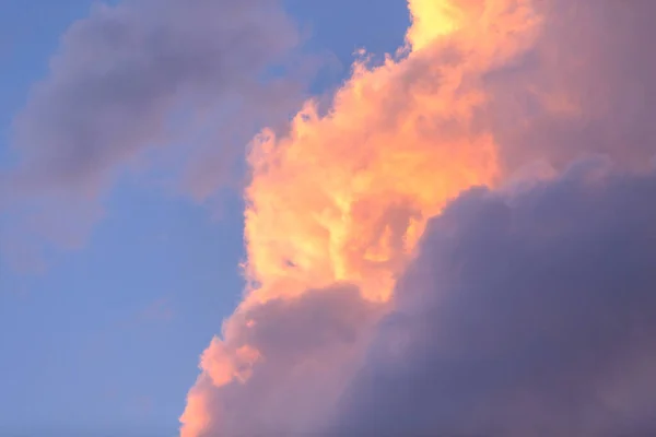 Yellow orange with pink color clouds in colorful blue sky