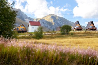 Durmitor mountains, Montenegro National Park, summer wooden houses clipart