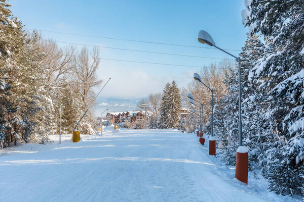Bansko, Bulgaria bulgarian winter resort with ski slope, lift cabins and gondola station