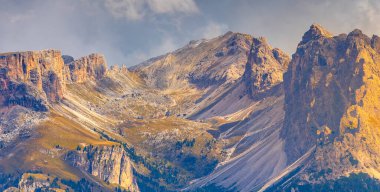 Sunset banner view of Italian Alps, Langkofel Group, view from Alpe di Siusi in Dolomites, Italy clipart