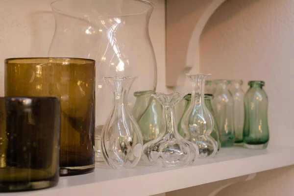 Old glass jars on a shelf