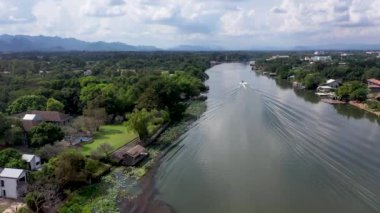aerial view of sailing boat over the Kwai river in Thailand.