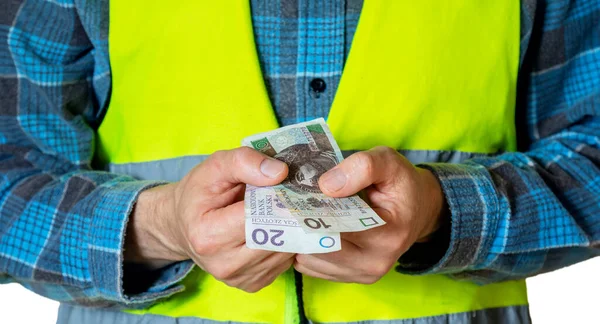 Man Work Clothes Production Employee Holds Thirty Polish Zlotys His — Stock Photo, Image