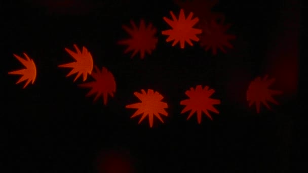 Red Bokeh Form Stars Radiance Garland Dark Background — Stock Video