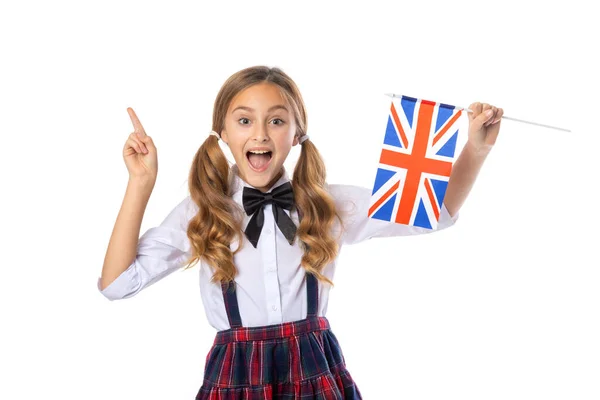 Χαμογελαστή Κοπέλα Που Κρατάει Σημαία Του Ηνωμένου Βασιλείου Απομονωμένη Στα Εικόνα Αρχείου