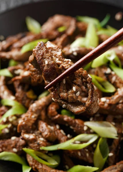 Korean beef Bulgogi BBQ with sesame seeds and spring onion