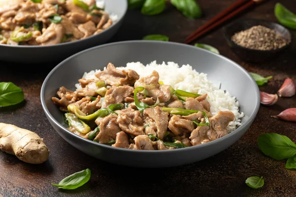 Chinese stir fry pork with ginger sauce, garlic and spring onion. Asian food.