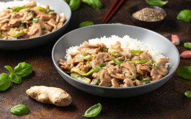 Chinese stir fry pork with ginger sauce, garlic and spring onion. Asian food.