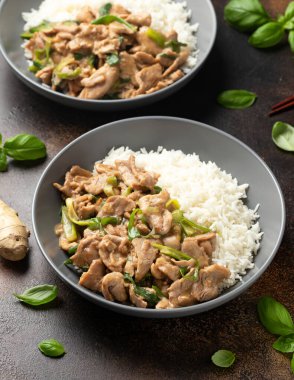 Chinese stir fry pork with ginger sauce, garlic and spring onion. Asian food.