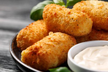 Homemade potato croquettes with mayonnaise. Traditional croquette