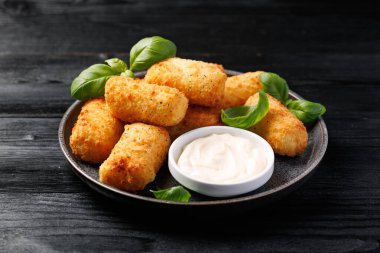 Homemade potato croquettes with mayonnaise. Traditional croquette