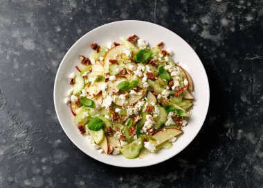 Crunchy Celery, Apple, Cucumber and Feta Cheese Salad. Healthy food