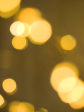 Ilık sarı ışıklar yarı soyut desenleri sunmak için odaklanmış olacak