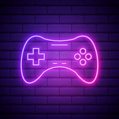 Duvarda eflatun pembe neon tabela Oyun kumandası simgesi, oyun sembolü