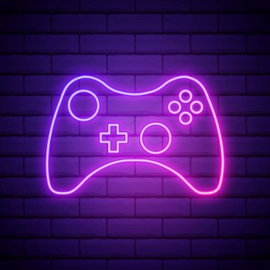 Duvarda eflatun pembe neon tabela Oyun kumandası simgesi, oyun sembolü