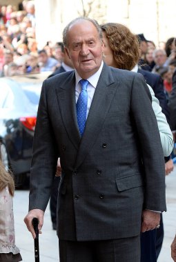 The King of Spain Don Juan Carlos  with other members of the Spanish  Royal Family attend Easter Mass in the Cathedral of Palma de Mallorca on April 20th 2014 clipart