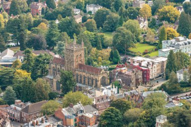 Beautiful buildings of downtown Great Malvern and Great Malvern Priory, England, UK clipart