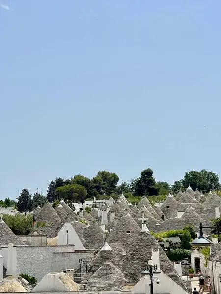 stock image Alberobello, Italy - July 2024. Trulli or Trullo house, an UNESCO World Heritage, in the City of Alberobello, Puglia Region, a famous touristic destination in south Italy.