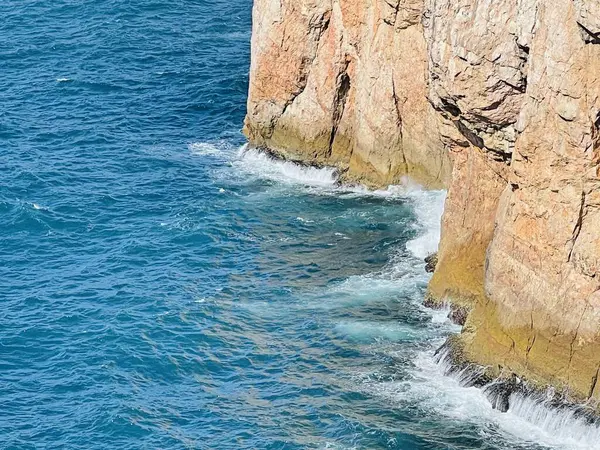 stock image View of strong waves hitting the rock at Cape St. Vincent. Continental Europes most South-western point, Sagres, Algarve, Portugal. 