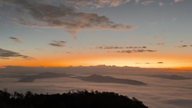 Pan View of Sea of Mist From Peak of Mountains at Sunrise