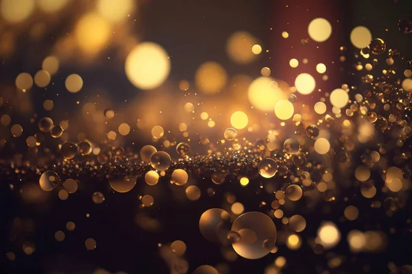 Golden glitter lights on isolated on dark background. Gold glitter dust defocused texture. Abstract sparkle particle bokeh