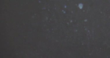 Blood spatter at the crime scene visualized with UV light and luminol