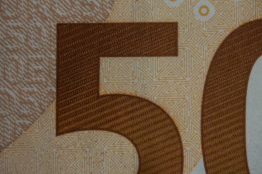 Euro bank note under the microskope