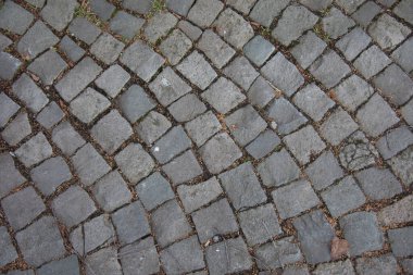 paved sidewalk with stone elements