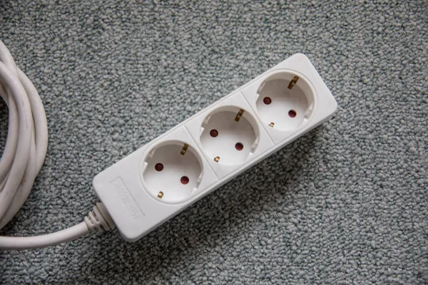 Extension cord with power strip for household power supply