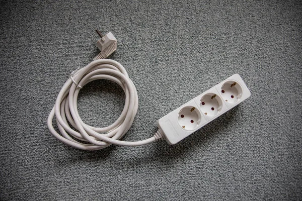 Extension cord with power strip for household power supply