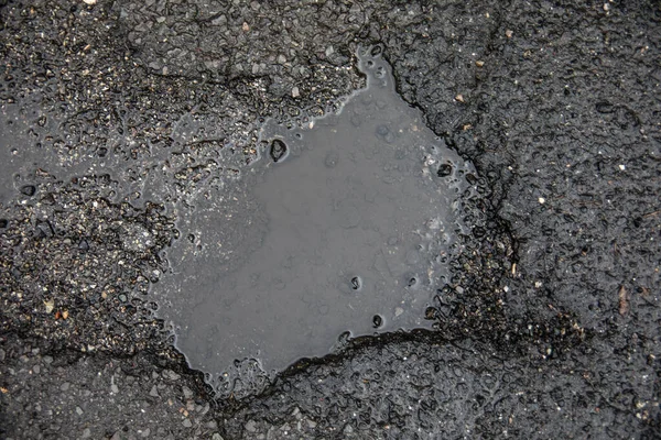 Road Damage Caused Potholes Asphalt Roadway Stock Image