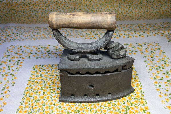 old antique iron iron with coal compartment