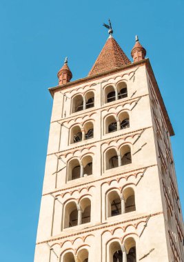 View of the Cathedral of Santo Stefano bell tower from the Piazza Duomo in the historic center of Biella, Piedmont, Italy clipart