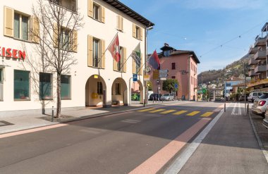 Vira Gambarogno, Ticino, Switzerland - March 21, 2024: Main street of Vira Gambarogno, the town overlooks Lake Maggiore, district of Locarno in the canton of Ticino. clipart
