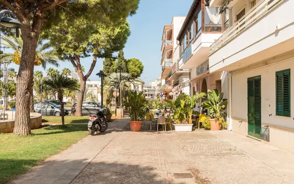 Stock image Porto Cesareo, Puglia, Italy - October 8, 2023: Street in the center of Porto Cesareo, seaside resort on the Ionian sea in Puglia, province of Lecce.