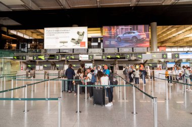 Catania, Sicily, Italy - October 10, 2024: The interior of the departure terminal at Catania-Fontanarossa International Airport in Sicily. clipart