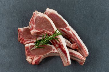 Lamb chops close up on plain background. clipart